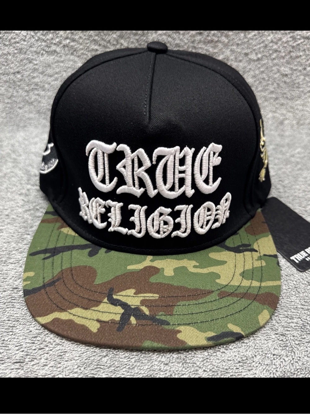 True Religion Horseshoe Logo Camo Brim Embroidered Script SnapBack Hat